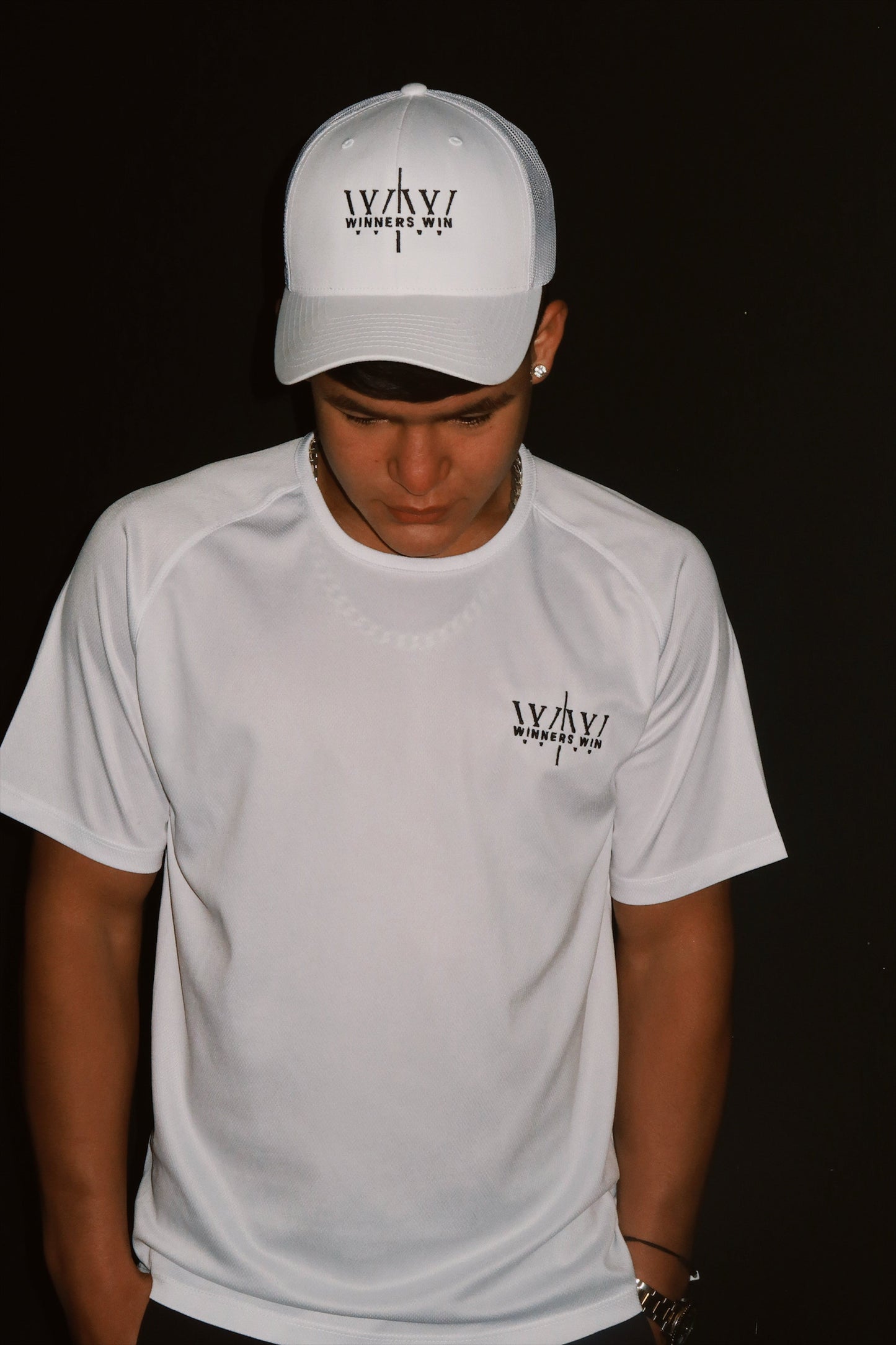 Winners Win white hat being modelled in Belfast