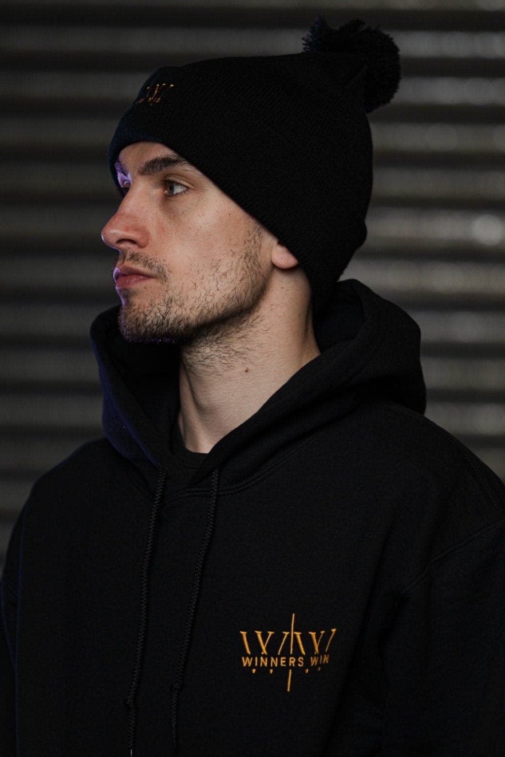 Black and gold Winners Win beanie