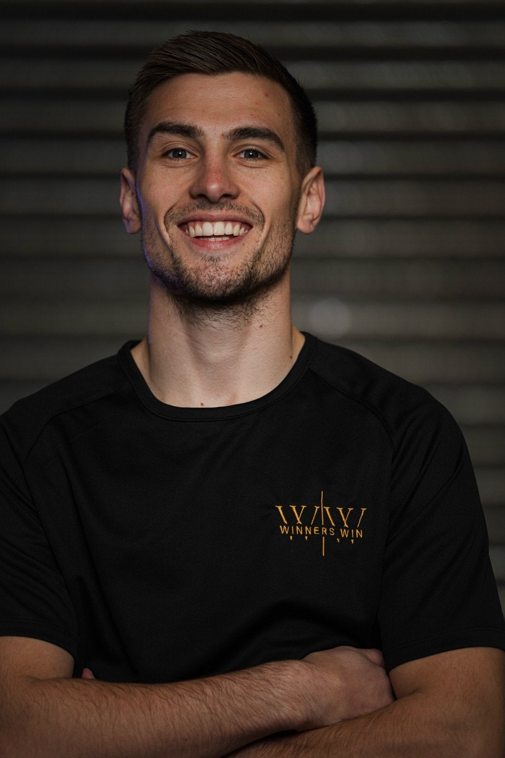 Paul Loonam Wearing the Winners Win performance t-shirt