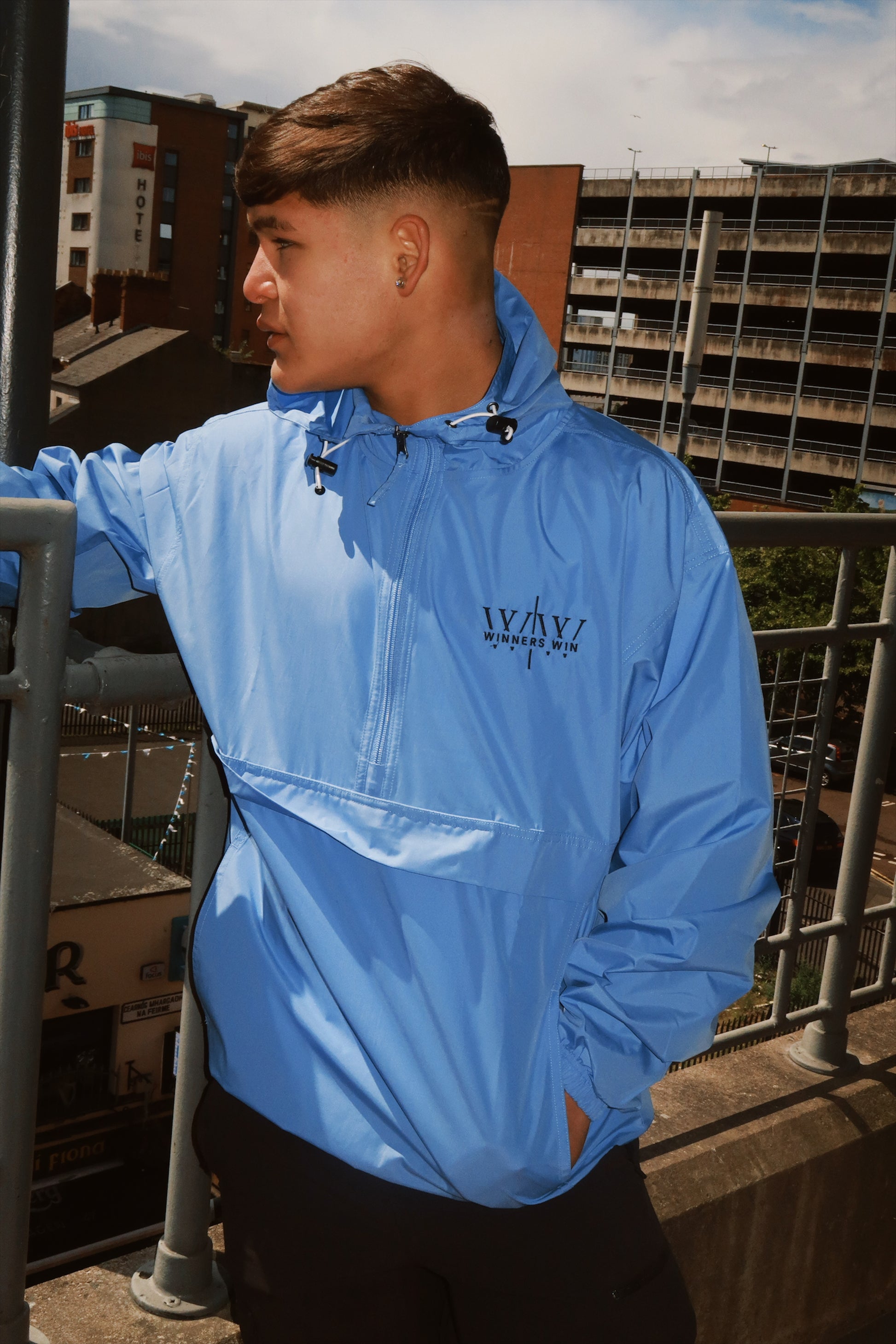 Winners Win Light blue waterproof running jacket