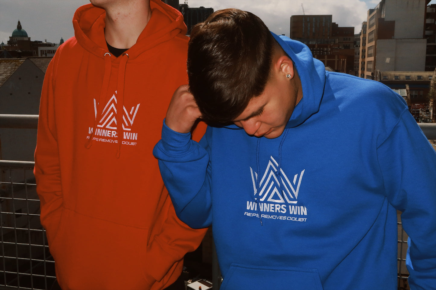 the red and blue reps removes doubt hoodies both being modelled in Belfast