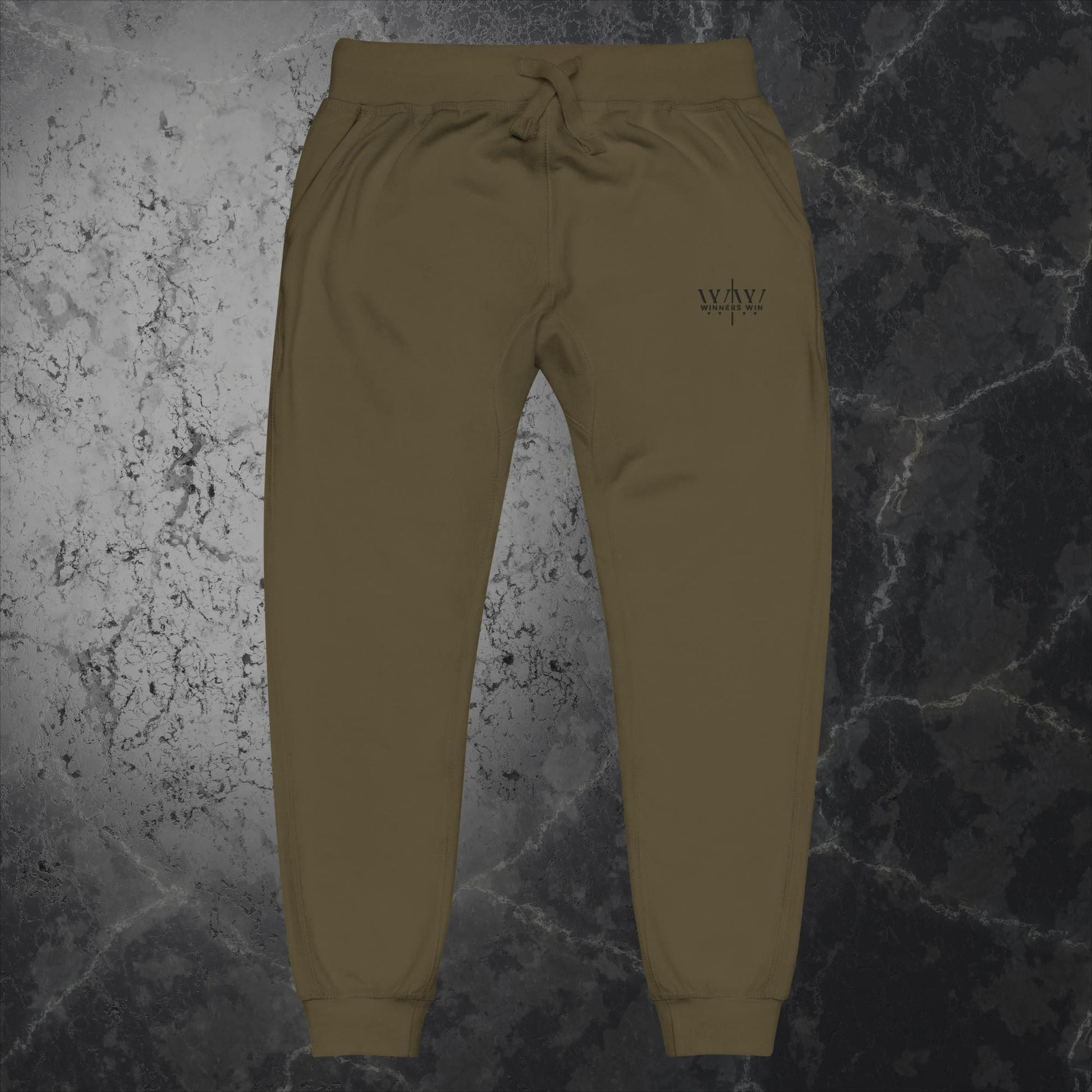 The Winners win sweat pants khaki edition, part of the full  tracksuit, our original Winners Win logo embroidered in jet black