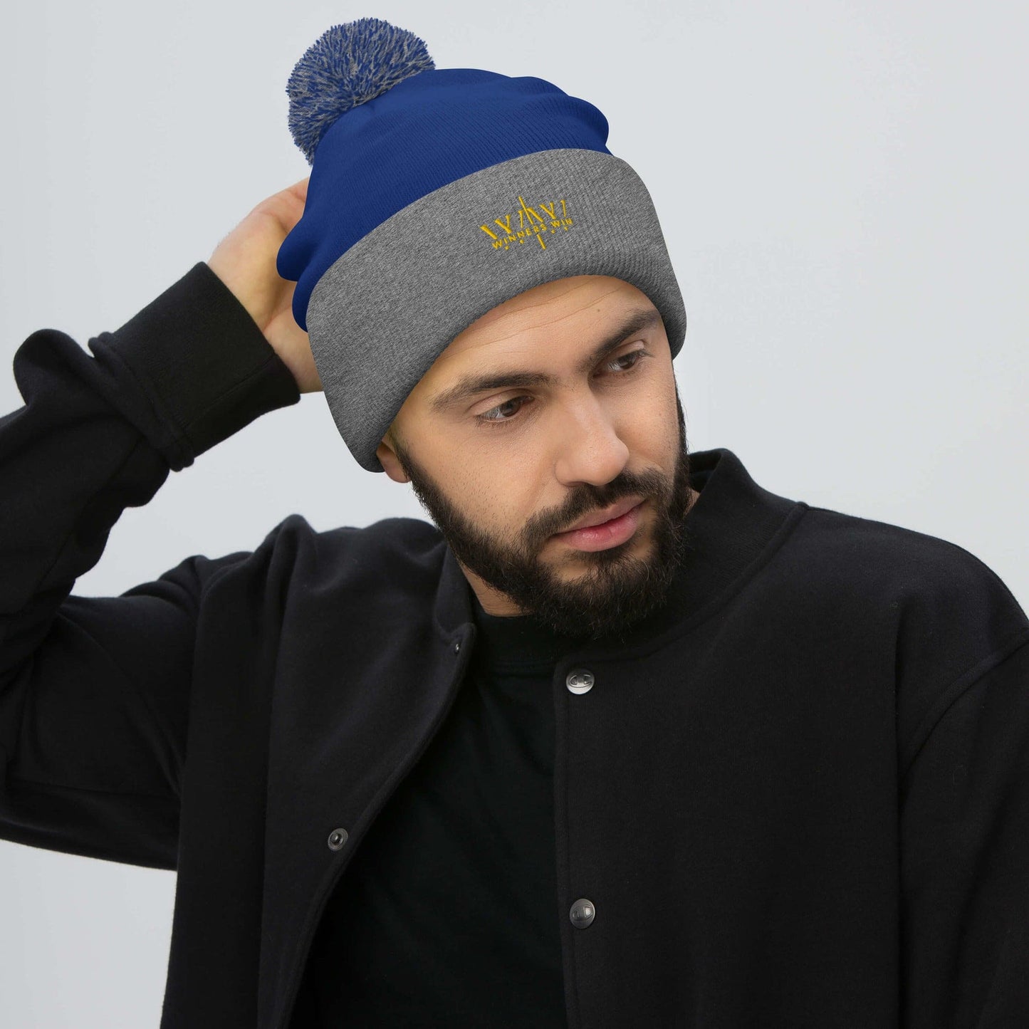 blue Winners Win beanie with gold Winners Win Logo