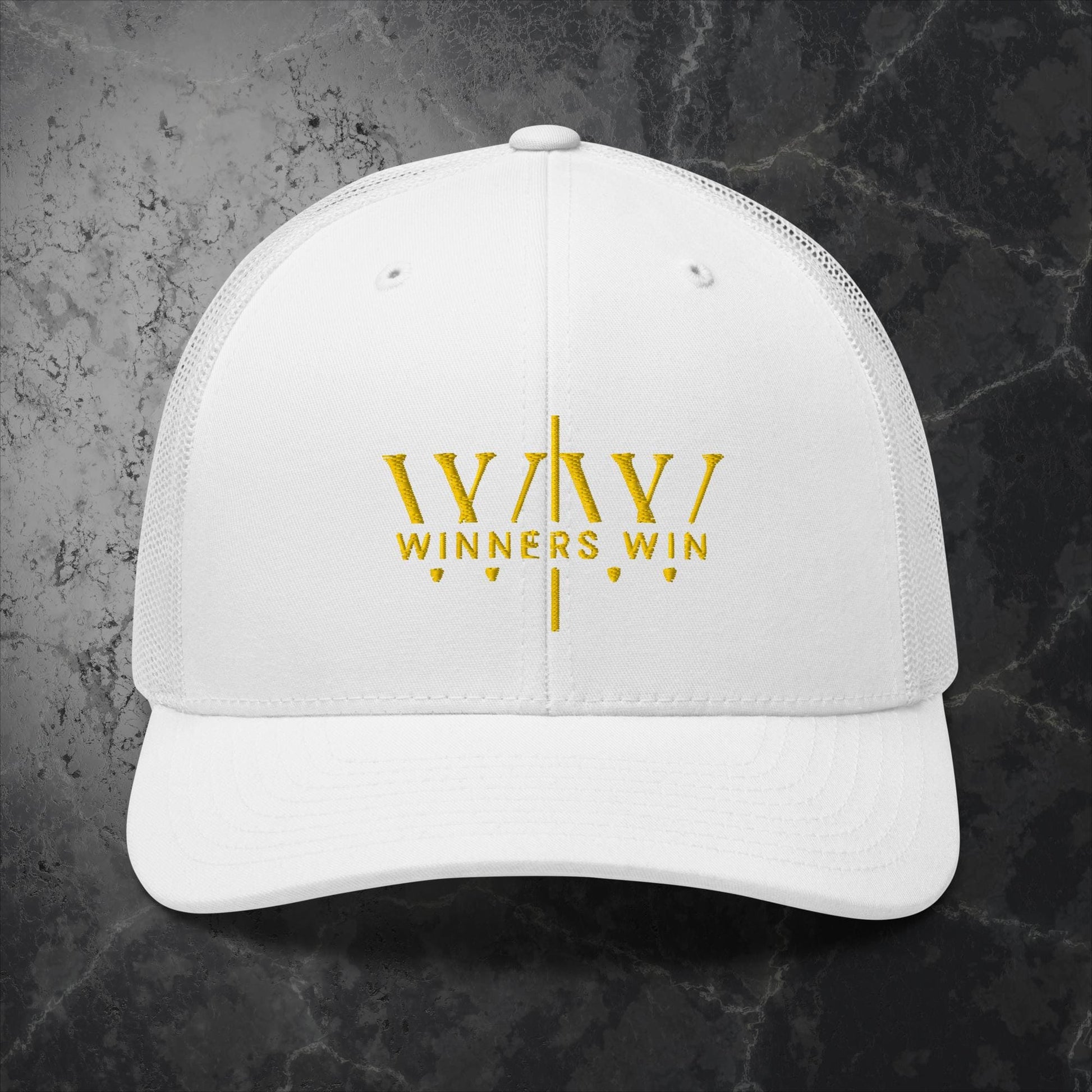 Winners Win white cap with the original Winners Win logo embroidered in gold