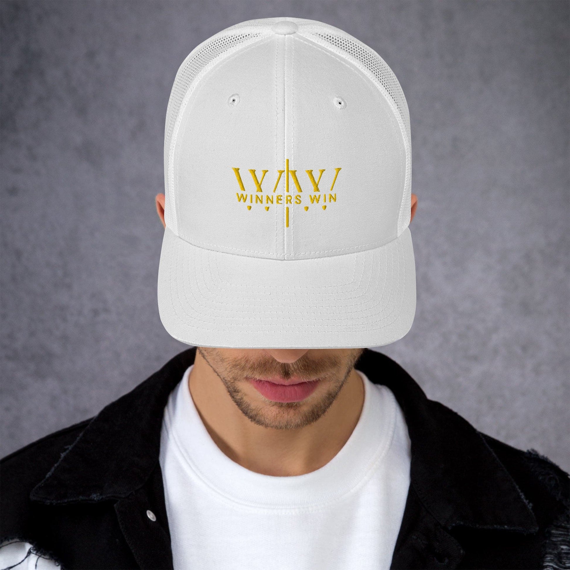 Winners Win white cap with the original Winners Win logo embroidered in gold