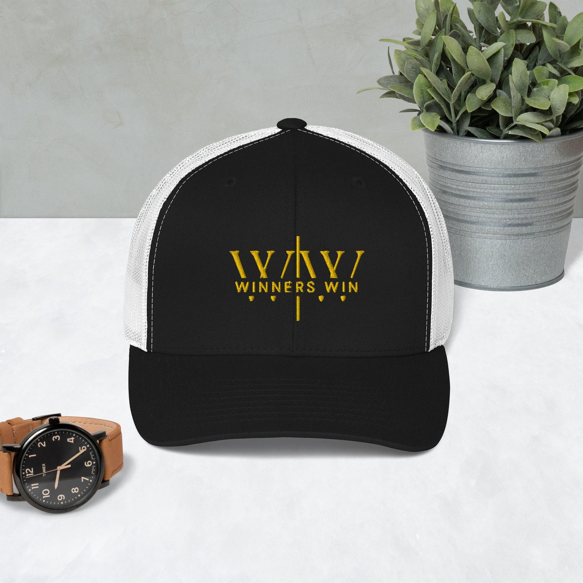 Winners Win black and white cap with the original Winners Win logo embroidered in gold