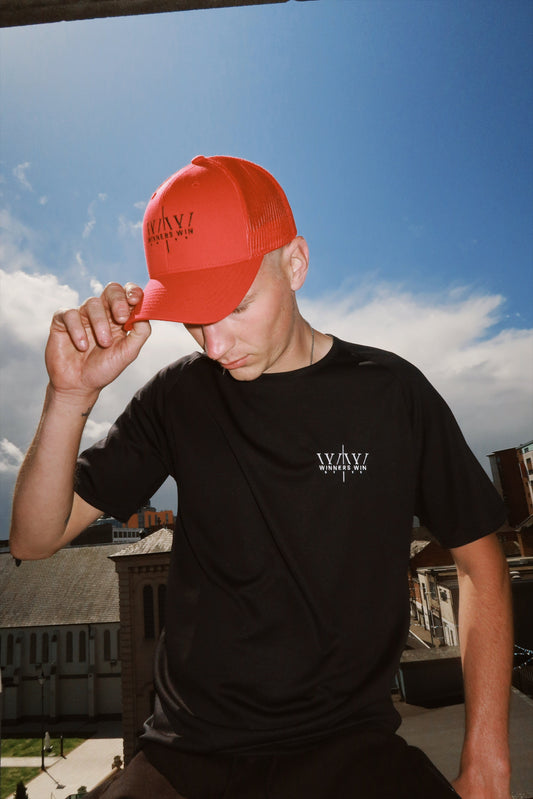 The red Winners Win cap being modelled in Belfast