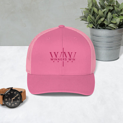 winners win pink hat