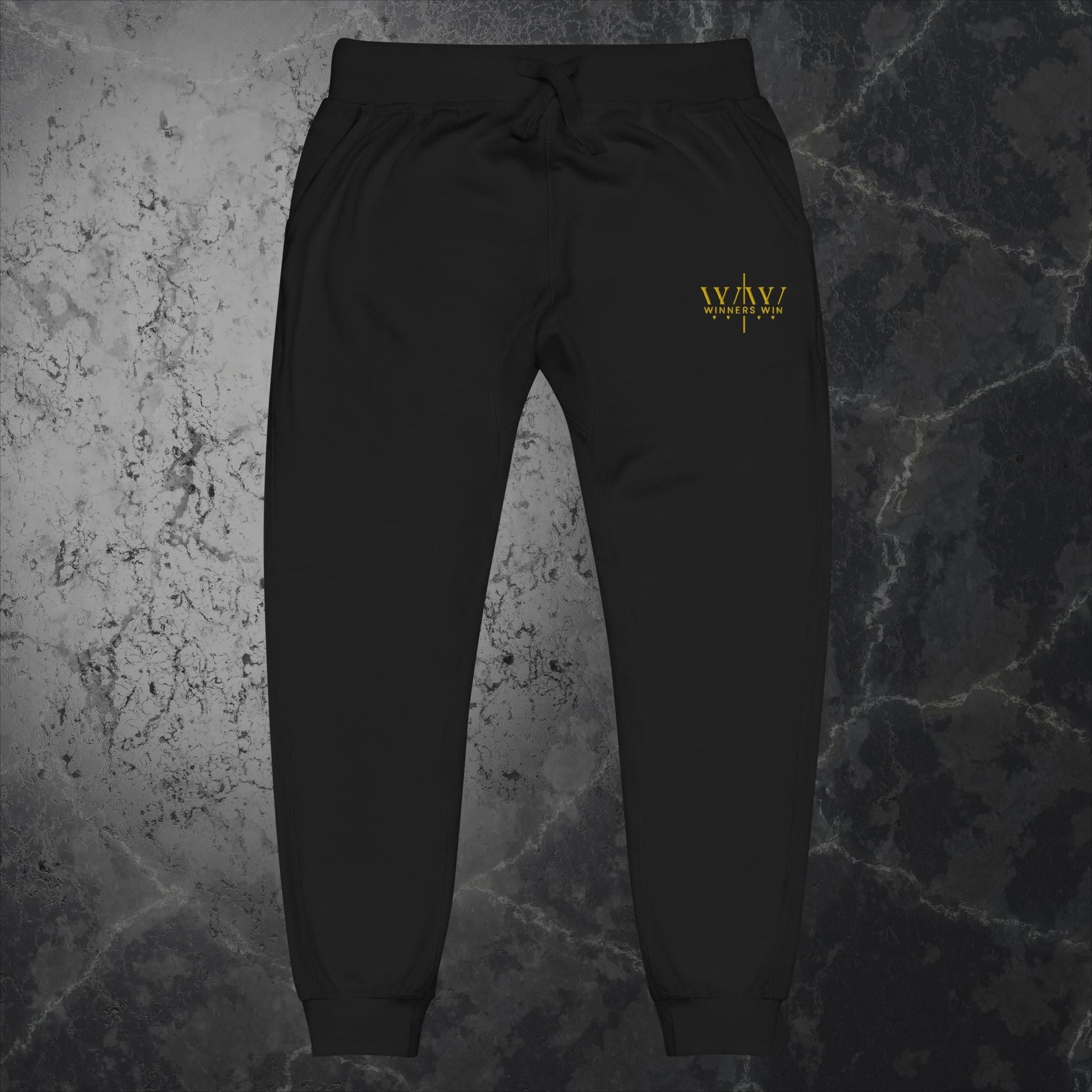 Winners Win sweat pants and the bottoms of the black full tracksuit